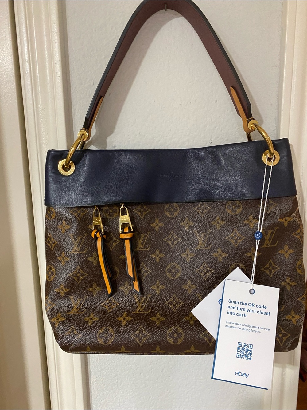 * Canvas peeling: Louis Vuitton Tuileries Monogram Shoulder Bag with Navy Trim